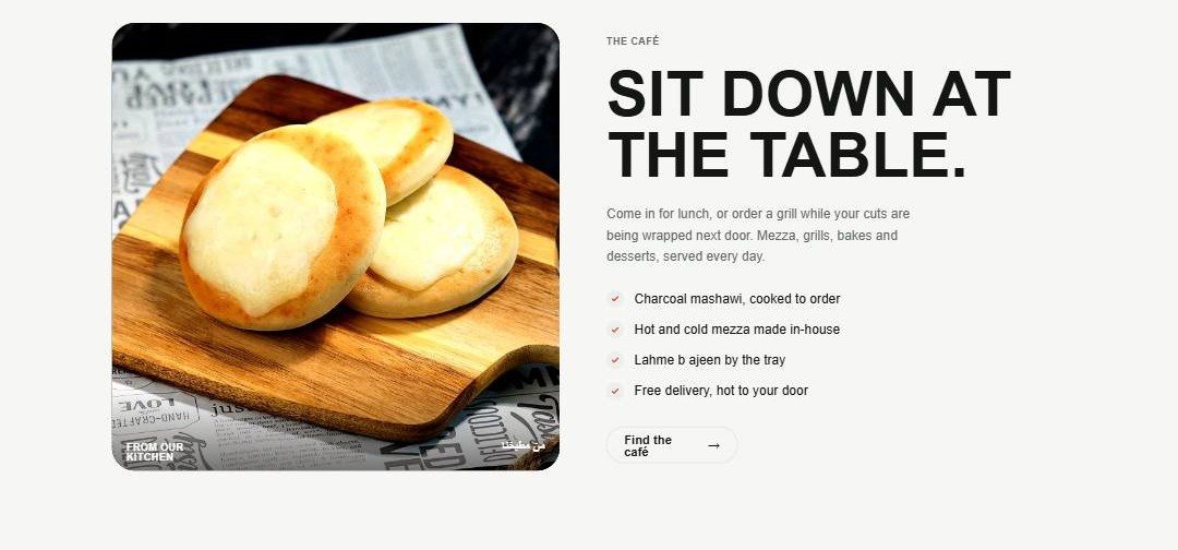 The café — sit down at the table